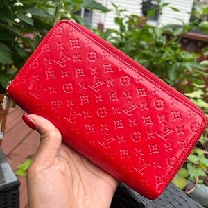 Red Louis Vuitton Wallet 
Patent Leather with Double Zipper
Lightly used
